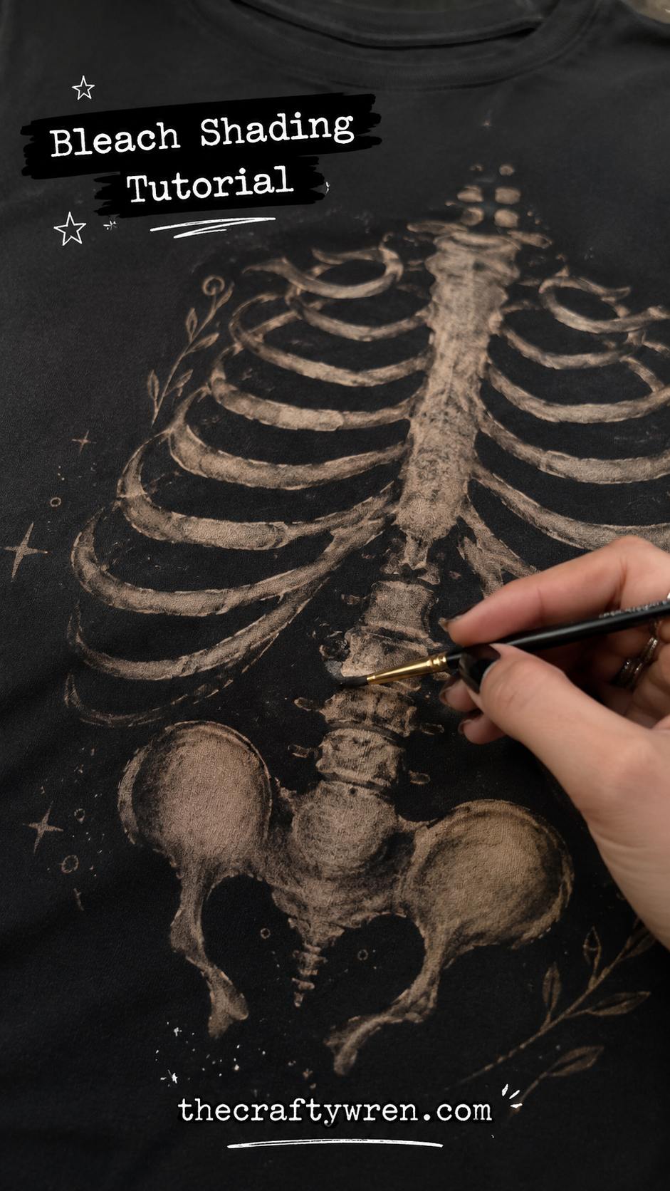 Hand shading a bleach-dyed skeleton design on a black tee, a creative diy gift idea for boyfriend