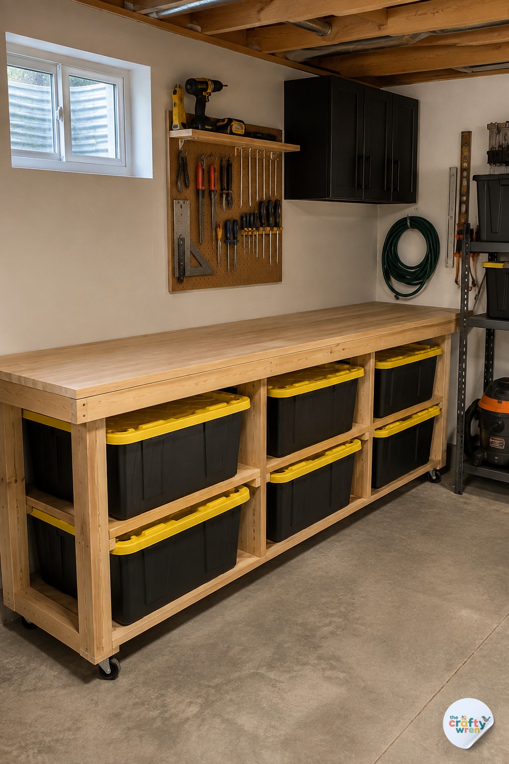 Rolling workbench with tote drawers underneath, a mobile garage storage solution on casters