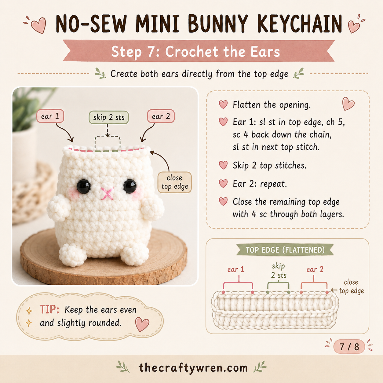 Flattened top edge of a bunny keychain amigurumi with two ears crocheted directly from the stitches