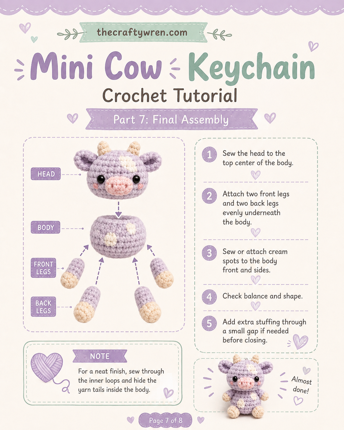 Head, body, and legs pinned together during final assembly of the pastel cow amigurumi keychain